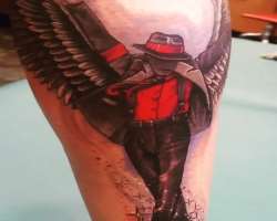 He has a tattoo represents MJ with angel wings on behind his leg, this tattoo was completed in nine hours.